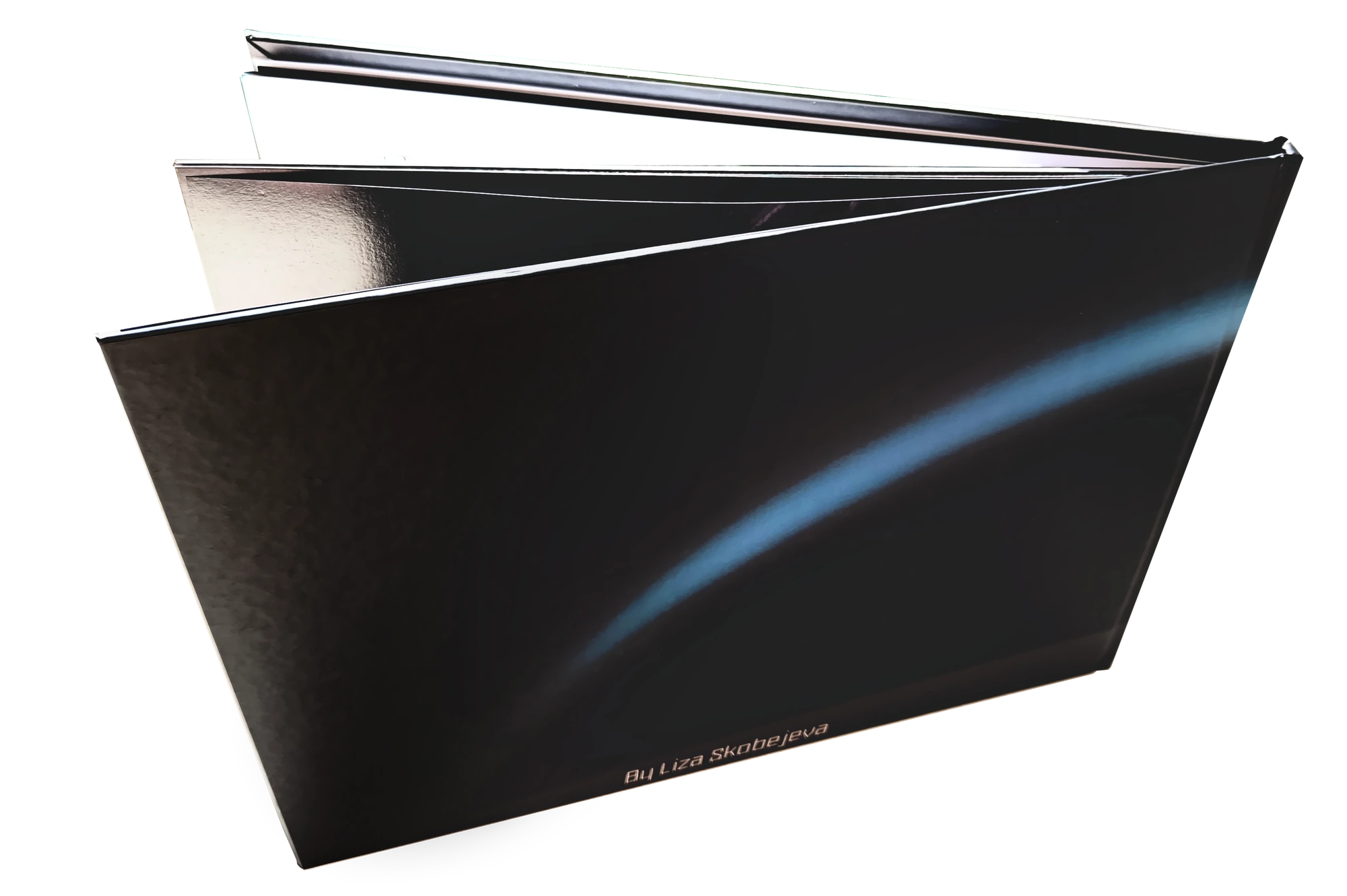 Beyond Us art book with its back cover facing the camera